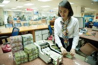 Lợi nhuận trước thuế của nhóm ngân hàng có vốn nhà nước chi phối được dự báo giảm gần 36% trong năm nay. Ảnh: Dũng Minh