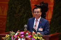 Bộ trưởng Bộ Tài chính Đinh Tiến Dũng trình bày tham luận tại Đại hội.