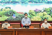 Thủ tướng Chính phủ Phạm Minh Chính chủ trì làm việc với TP Hà Nội về công tác phòng chống dịch Covid-19 và những nhiệm vụ, giải pháp thúc đẩy sản xuất, kinh doanh trong những tháng cuối năm 2021. (Ảnh: Thanh Hải)