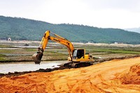 Việc triển khai các hạng mục hạ tầng tại Trung tâm điện lực Quảng Trạch gặp nhiều khó khăn do vướng giải phóng mặt bằng.