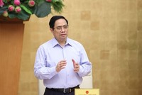 Thủ tướng Phạm Minh Chính yêu cầu rà soát pháp luật, tháo gỡ khó khăn cho đầu tư, kinh doanh trong điều kiện dịch COVID-19. Ảnh: TTXVN
