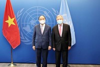 Chủ tịch nước Nguyễn Xuân Phúc gặp Tổng thư ký Liên hợp quốc Antonio Guterres. (Ảnh: TTXVN)