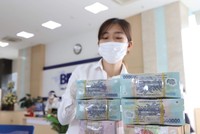 Nợ xấu tiềm ẩn đang tăng và lợi nhuận ngành ngân hàng chịu áp lực giảm. Ảnh: Dũng Minh