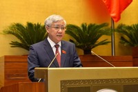 Chủ tịch Uỷ ban Trung ương Mặt trận Tổ quốc Việt Nam (MTTQ) Đỗ Văn Chiến báo cáo Quốc hội trong phiên khai mạc kỳ họp thứ hai, sáng 20/10.