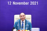 Chủ tịch nước Nguyễn Xuân Phúc tham dự hội nghị các nhà lãnh đạo kinh tế APEC lần thứ 28 được tổ chức theo hình thức trực tuyến. (Ảnh: TTXVN)
