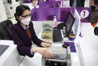 NIM giảm mạnh sẽ ảnh hưởng tới khả năng chống đỡ nợ xấu. Ảnh: Dũng Minh