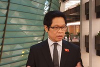 Ông Vũ Tiến Lộc, đại biểu Quốc hội Hà Nội trao đổi với phóng viên Báo Đầu tư bên lề phiên họp sáng 7/1/2021.