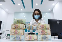  Nếu trích lập dự phòng rủi ro ngay bây giờ thì lợi nhuận ngân hàng sẽ giảm mạnh. Ảnh: Dũng Minh