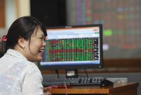 Kỳ ĐHCĐ tới đây sẽ là điểm ‘bản lề’ để nhóm cổ phiếu ngân hàng thu hút sự chú ý từ thị trường. Ảnh: Dũng Minh