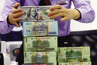 Dự kiến tỷ giá năm nay chỉ tăng khoảng 1-1,5% so với năm ngoái do quan hệ cung - cầu ngoại tệ tương đối tốt. Ảnh: Đức Thanh