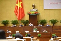 Bộ trưởng Bộ Công an Tô Lâm trả lời chất vấn từ phòng hop Diên Hồng.