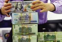 Lộ trình tăng lãi suất của Fed gây áp lực lên tỷ giá