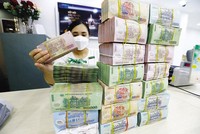 Tăng lãi suất, song nguồn vốn ngân hàng vẫn khá hạn chế. Ảnh: Đức Thanh