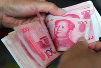 Đồng nhân dân tệ giao ngay mở cửa phiên giao dịch 13/2 ở mức 6,8349 CNY đổi 1 USD. Ảnh: AFP
