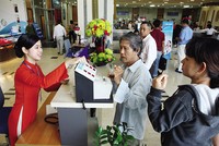 Tranh cãi về mức room ngoại tại Sacombank đến nay vẫn chưa ngã ngũ. Ảnh: Đức Thanh