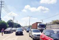 Đăng kiểm xe mất nhiều thời gian khiến các doanh nghiệp vận tải càng thêm khó khăn. Ảnh: Hải Phong