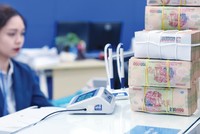 Tính đến cuối tháng 6/2023, tổng dư nợ (gốc, lãi) được cơ cấu giữ nguyên nhóm nợ của ngành ngân hàng theo Thông tư 02 là gần 62.500 tỷ đồng. Ảnh: Dũng Minh 