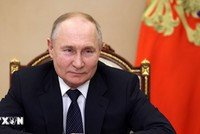 Tổng thống Nga Vladimir Putin tại cuộc họp trực tuyến ở Moskva. (Ảnh: AFP/TTXVN)