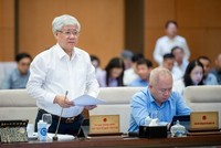 Chủ tịch Ủy ban Trung ương Mặt trận Tổ quốc Việt Nam Đỗ Văn Chiến trình bày báo cáo.