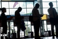 Người lao động đăng ký tìm việc tại hội chợ việc làm ở Sunrise, bang Florida (Mỹ). (Ảnh: Getty Images/TTXVN)