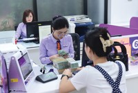 Định hướng của ngành ngân hàng là ổn định mặt bằng lãi suất, phấn đấu hạ lãi suất cho vay. Ảnh: Dũng Minh 