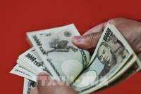 Đồng tiền mệnh giá 10.000 yen của Nhật Bản. (Ảnh: AFP/TTXVN)