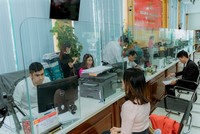 Các doanh nghiệp sẽ không phải mất phí khi thực hiện các thủ tục cập nhật lại thông tin do thay đổi thông tin đơn vị hành chính. Ảnh: Anh Khoa