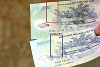 Ngân hàng phải báo công an khi phát hiện ít nhất 5 tờ tiền giả trong một giao dịch 