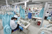 Tập đoàn Vinatex đang đẩy nhanh tốc độ sản xuất các đơn hàng đã ký trong quý II