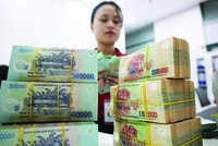 Nợ xấu ngân hàng đang có xu hướng gia tăng, trong khi xử lý nợ xấu gặp nhiều khó khăn. Ảnh: Dũng Minh 