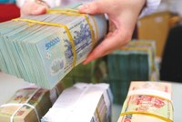 Dự thảo Luật Ngân sách nhà nước (sửa đổi) nâng mức trần nợ vay cho các địa phương lên 80 - 120% số dự toán thu ngân sách địa phương được hưởng theo phân cấp. Ảnh: Minh Dũng