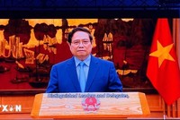 Thủ tướng Chính phủ Phạm Minh Chính gửi thông điệp tới hội nghị. (Ảnh: TTXVN).
