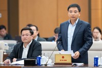 Bộ trưởng Bộ Tài chính Nguyễn Văn Thắng báo cáo tại phiên họp - Ảnh: PT. 