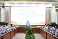 Phó thủ tướng Thường trực Nguyễn Hòa Bình tại cuộc làm việc với TP.HCM nhằm tháo gỡ vướng mắc, khó khăn cho các dự án - Ảnh: VGP