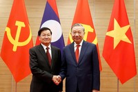Tổng Bí thư Tô Lâm cùng Tổng Bí thư, Chủ tịch nước Lào Thongloun Sisoulith. Ảnh: Đức Thanh