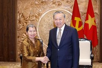 Tổng Bí thư Ban Chấp hành Trung ương Đảng Cộng sản Việt Nam Tô Lâm cùng bà Men Sam An, Phó Chủ tịch Đảng Nhân dân Campuchia. Ảnh: TTXVN