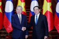 Tổng Bí thư Tô Lâm hội kiến Thủ tướng Chính phủ Lào Sonexay Siphandone. Ảnh: Thống Nhất/TTXVN