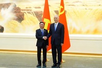  Thường trực Ban Bí thư Trần Cẩm Tú (trái) và Chánh Văn phòng Trung ương Đảng Cộng sản Trung Quốc tại buổi hội đàm. Ảnh: TTXVN.