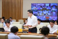  Thứ trưởng Bộ Tài chính Trần Quốc Phương báo cáo tại Hội nghị. Ảnh: VGP