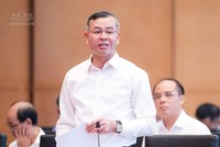 Bộ trưởng Bộ Tài chính Ngô Văn Tuấn hồi âm các vấn đề được đại biểu quan tâm - Ảnh: QH. 