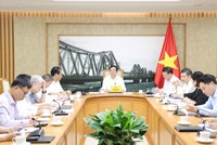 Phó Thủ tướng Hồ Quốc Dũng chủ trì cuộc họp với các bộ, cơ quan liên quan về hoàn thiện hồ sơ Dự án Luật Đất đai sửa đổi - Ảnh: chinhphu.vn