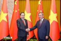 Chủ tịch Quốc hội Trần Thanh Mẫn hội kiến Thủ tướng Trung Quốc Lý Cường. Ảnh: Doãn Tấn/TTXVN