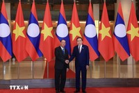 Chủ tịch Quốc hội Trần Thanh Mẫn và đồng chí Vilay Lakhamphong, Ủy viên Bộ Chính trị, Thường trực Ban Bí thư Trung ương Đảng Nhân dân Cách mạng Lào đang thăm chính thức Việt Nam. (Ảnh: Tuấn Anh/TTXVN)