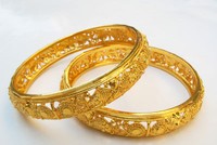 Vàng lắc trở lại, USD quay đầu giảm