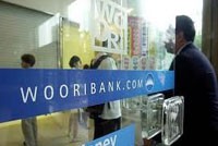 Lợi nhuận quý III của Woori vượt dự đoán