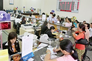Các ông chủ ngân hàng thận trọng khi nói về năm 2014