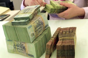 Tín dụng toàn ngành ngân hàng giảm trên 1% tính đến ngày 13/3