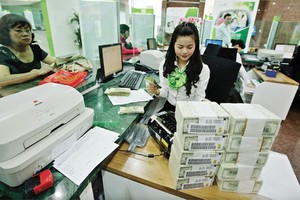 Năm 2014, Vietcombank đặt mục tiêu huy động vốn từ nền kinh tế 384.493  tỷ đồng