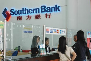 Nợ xấu vẫn đe dọa lợi nhuận ngân hàng năm 2014