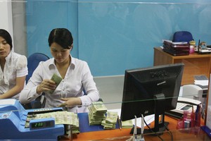 Tái cấu trúc ngân hàng dần đi vào chiều sâu